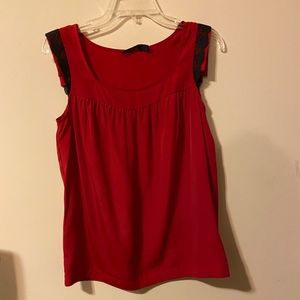 The limited red with black lace trim top size s